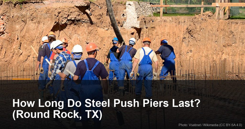 How Long Do Steel Push Piers Last? (Round Rock, TX) 9 Crew pouring concrete into a reinforced foundation — Round Rock, TX foundation repair