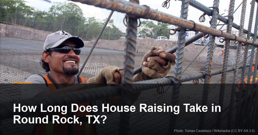 Construction worker in a safety vest tying rebar — Round Rock, TX foundation repair