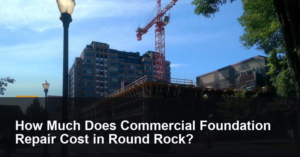 Multi-story commercial building under construction with a tower crane — Round Rock, TX foundation repair