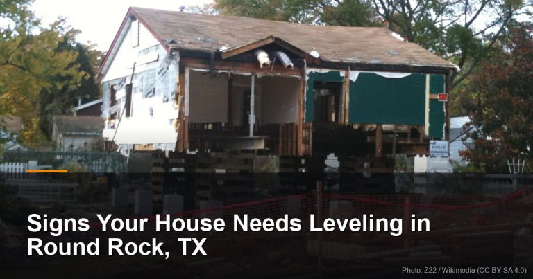 House raised above its foundation on timber cribbing — Round Rock, TX foundation repair